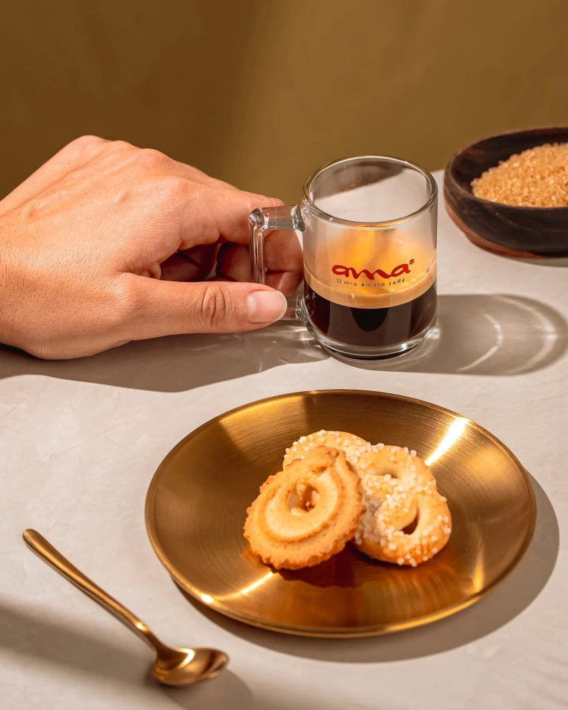 Ama Caffè espresso served with butter cookies