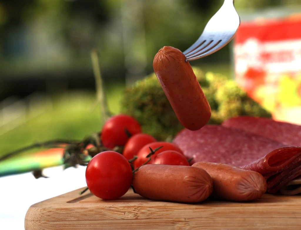 Bosna cocktail sausages served with cherry tomatoes