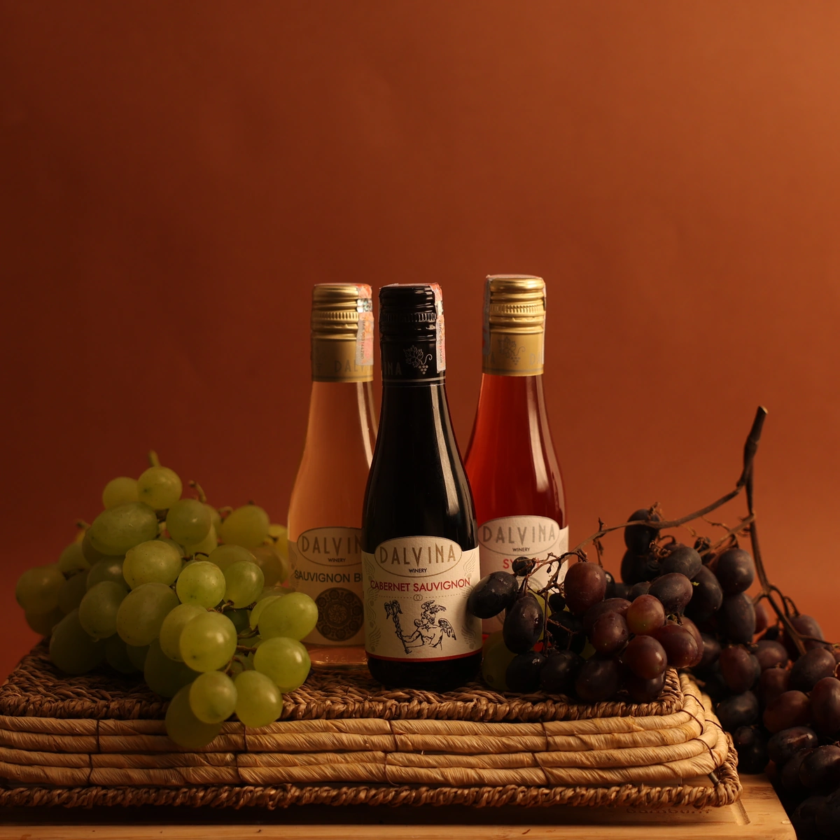 Dalvina mini wine bottles with grapes