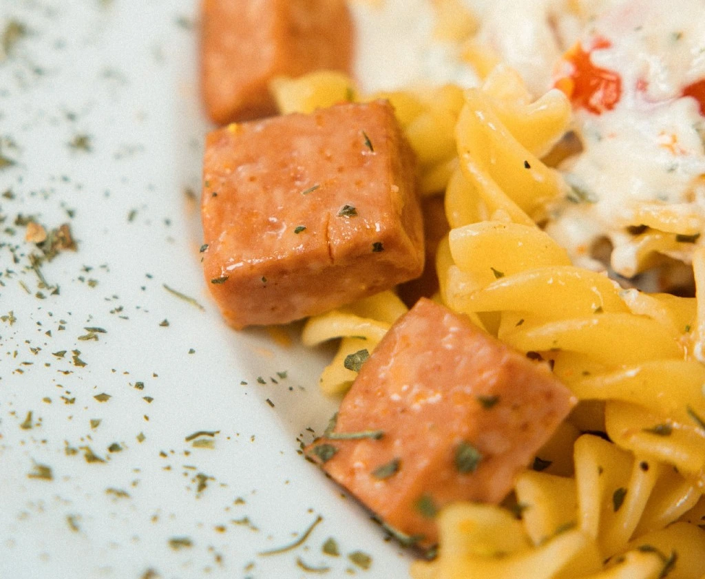 HANA Gold luncheon meat served with rotini pasta