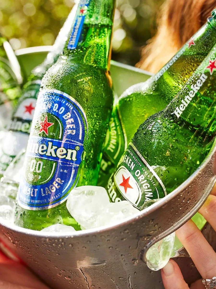 Heineken bottles in an ice bucket