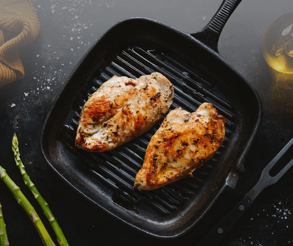 Keskinoglu grilled chicken breasts in a cast-iron pan