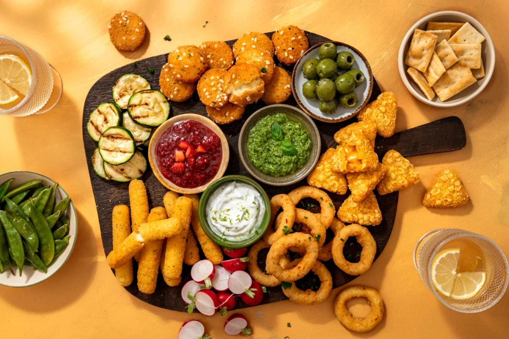 La Le Duc appetizer platter with onion rings and mozzarella sticks