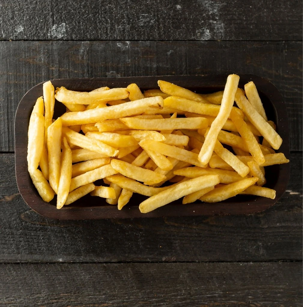 MyDibel golden French fries in a wooden bowl
